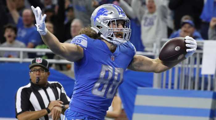 Detroit Lions tight end T.J. Hockenson scores a touchdown against the Seattle Seahawks during the first half at Ford Field, Oct. 2, 2022.
